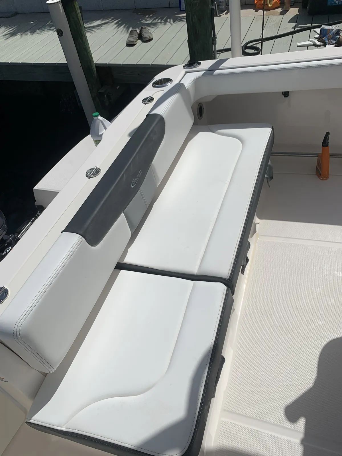 Clean white Robalo bench seats after a Demboys boat detail in Jupiter, FL