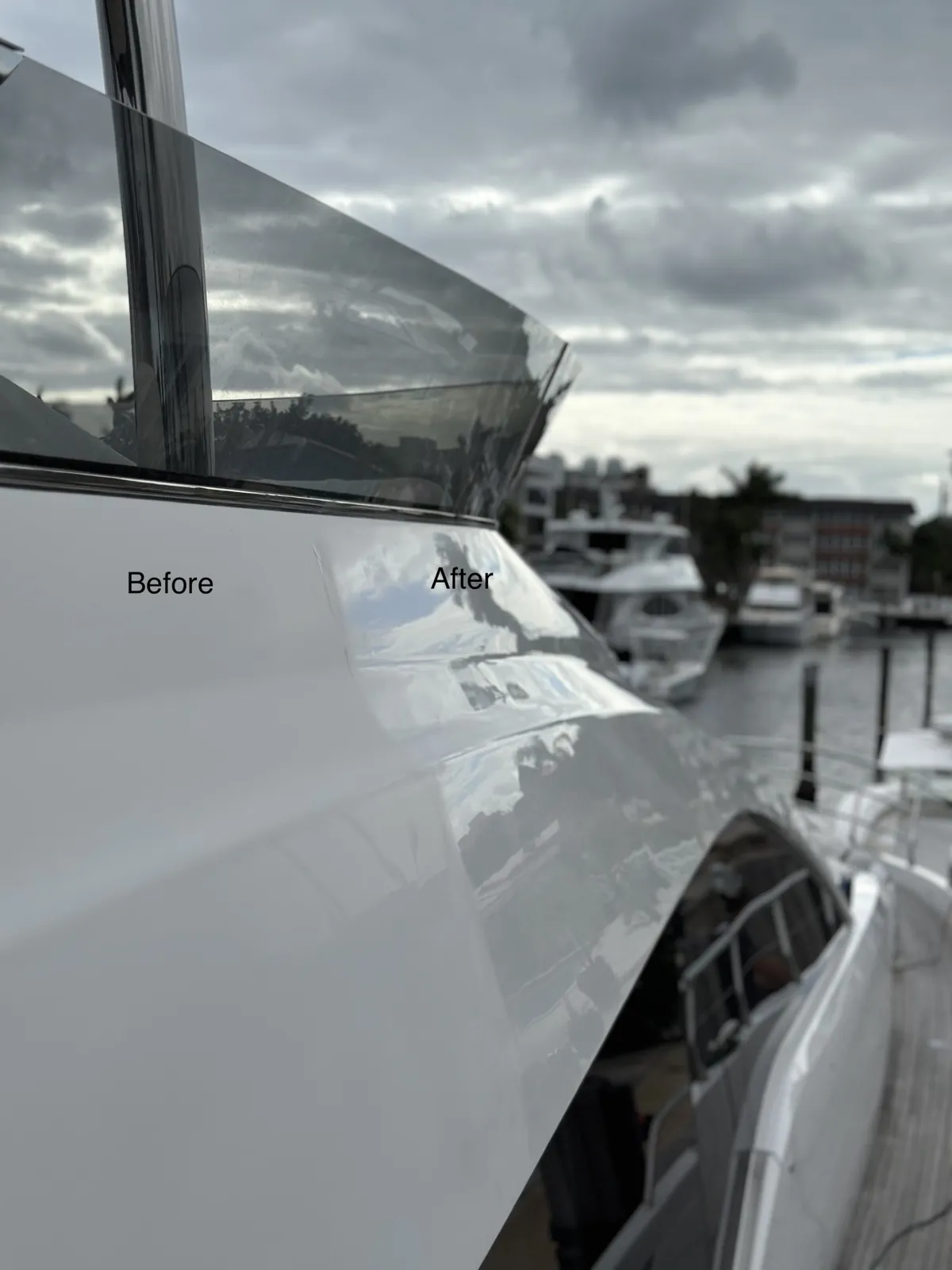 Yacht hull at The Landings in Lauderdale-by-the-Sea, FL split into a dull before side and a glossy after side